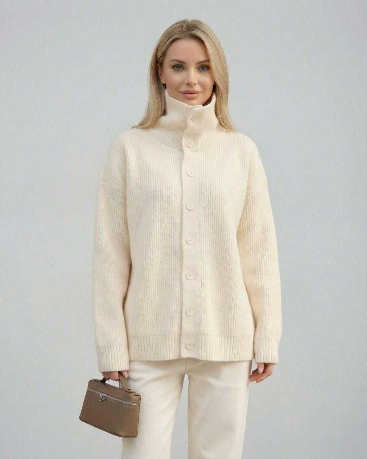 Ana Sweater by RAMBLION, white ribbed sweater with high collar, perfect for chilly evenings and stylish outings.