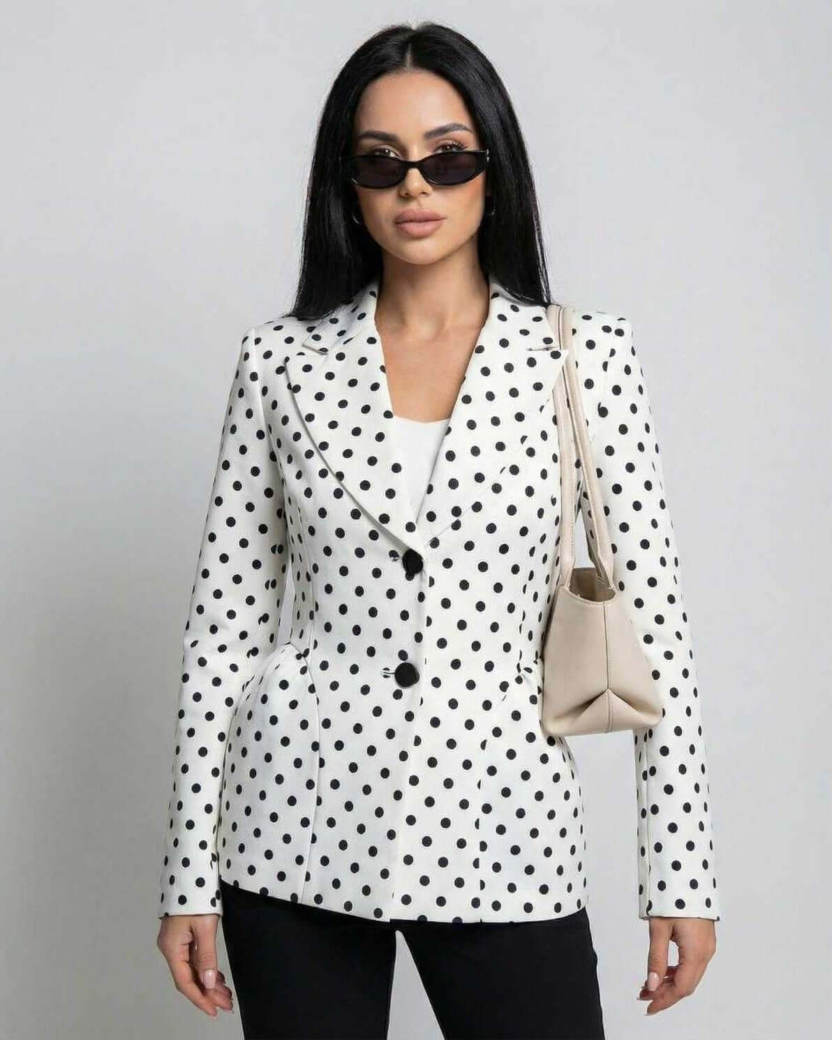 Rina Jacket by RAMBLION, polka dot pattern, elegant structured silhouette, stylish for various occasions.