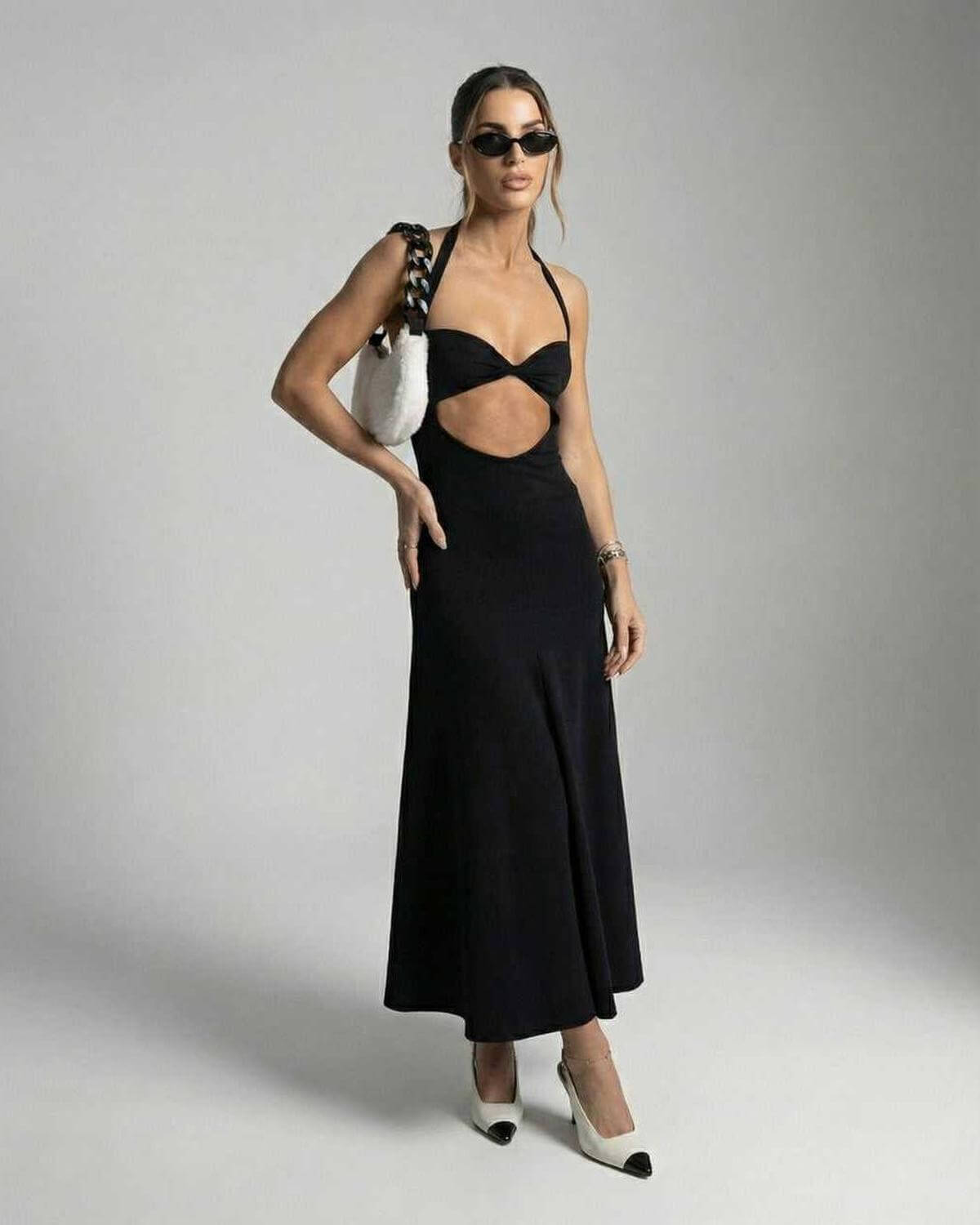 Glow Midi Dress featuring a V-neck cutout, sophisticated black design by RAMBLION, perfect for fashion-forward occasions.