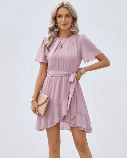 Mova Mini Dress by RAMBLION in pink satin, featuring a round neck, perfect for spring events and casual outings.