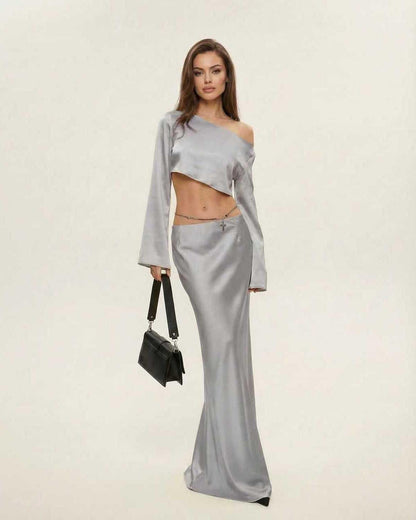 Lexa Midi Dress in luxurious grey satin with asymmetrical design, perfect for evening wear by RAMBLION.
