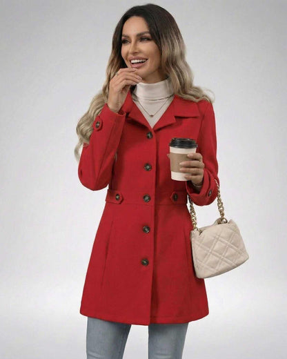 Elegant woman wearing a Crimson Sculpt Jacket in red, holding a coffee cup, showcasing modern style and tailored fit.