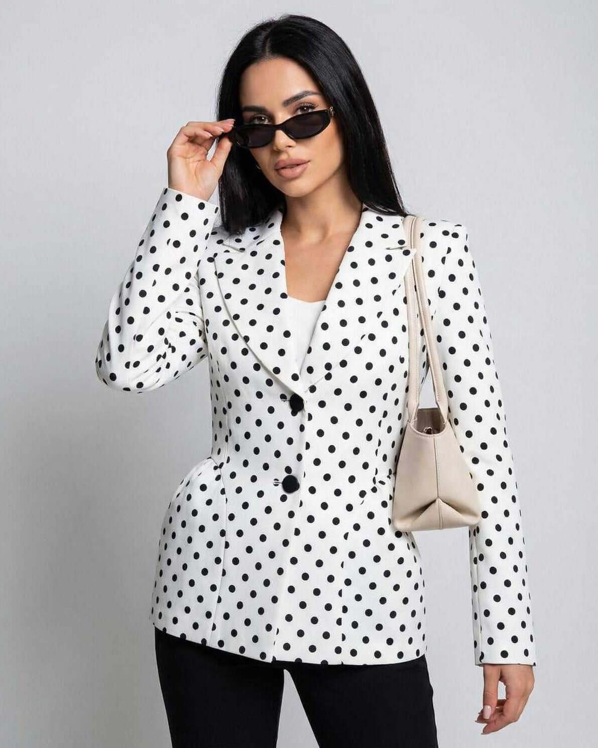 Rina Jacket by RAMBLION, white polka dot design, stylish and structured, perfect for chic outings.