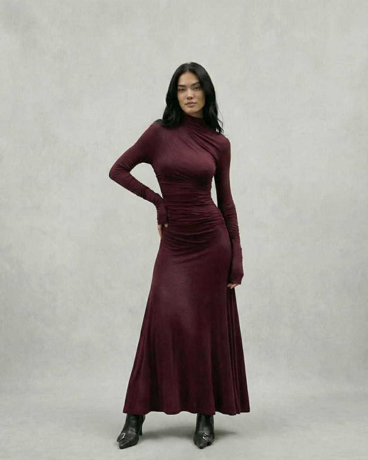 Vafy Maxi Dress in deep burgundy, featuring a refined silhouette and elegant long sleeves, perfect for evening occasions. RAMBLION.