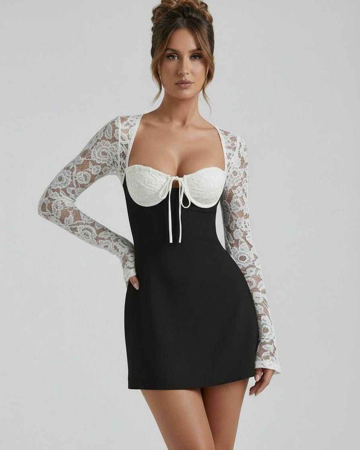 Vafy Mini Dress featuring black fabric, white lace, and elegant square neck design, perfect for chic occasions by RAMBLION.