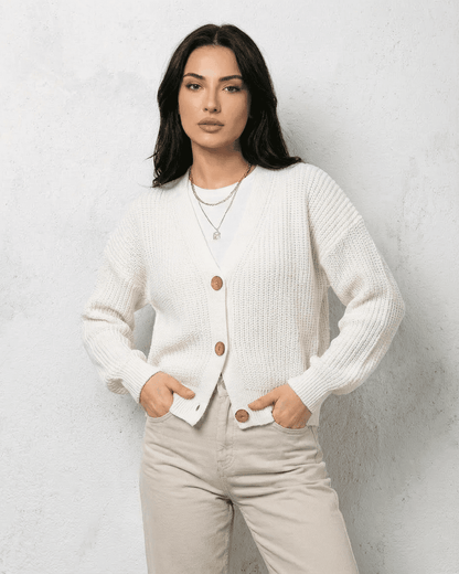 Alba Cardigan by RAMBLION in classic white with soft V-neck and button details, perfect for layered fall styles.