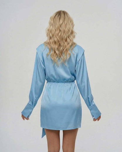 Anma Mini Dress in blue satin, featuring a V neck and wrap design, perfect for elegant occasions by RAMBLION.