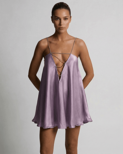 Anna Mini Dress in radiant purple satin, featuring a V neck and comfortable silhouette, perfect for summer occasions by RAMBLION.