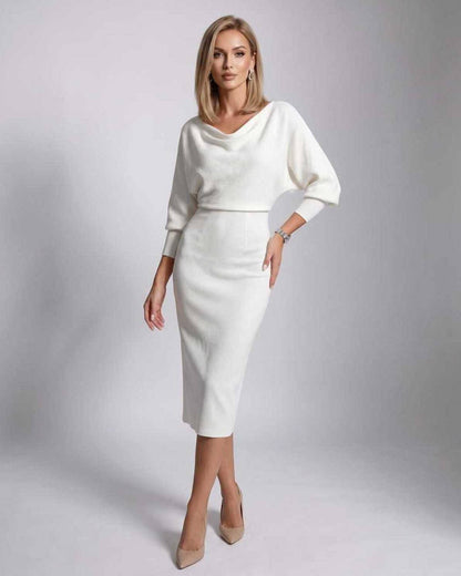 Ramblion Anya midi dress — cowl neck neckline · front view · styled for cocktail season