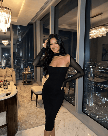 Reda Midi Dress featuring high neck, sheer sleeves, and a sleek silhouette perfect for elegant events by RAMBLION.