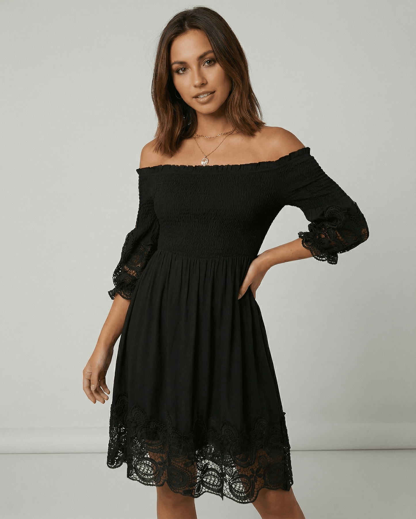 Arli Midi Dress: Black midi-length, off-shoulder, lace details, chic style, perfect for sophisticated occasions by RAMBLION.
