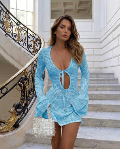 Azure Mini Dress by RAMBLION, featuring deep V-neck, tie-front, fitted silhouette, and elegant flare sleeves, perfect for warm occasions.