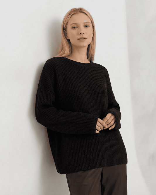 Beja Sweater by RAMBLION, cozy black ribbed knit, perfect for cooler months, versatile style for any occasion.