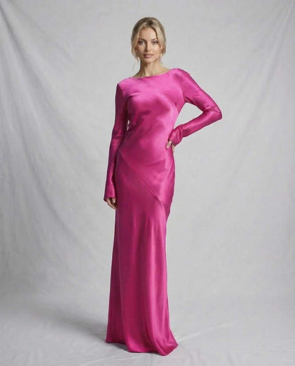 Bess Maxi Dress featuring a vibrant pink satin finish, elegant silhouette, ideal for sophisticated occasions by RAMBLION.