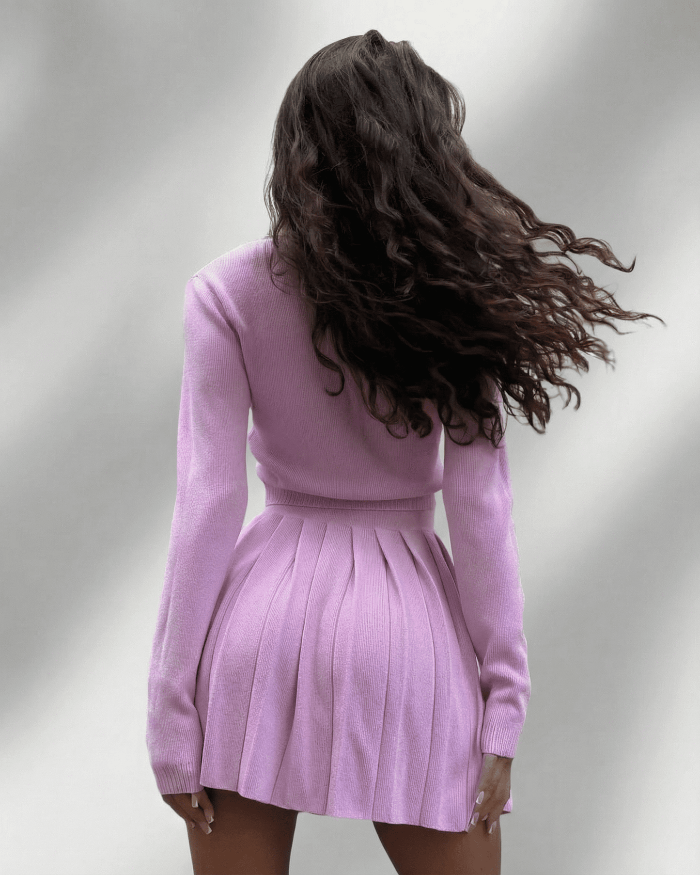 Bianca Set by RAMBLION, pink knit mini dress with pleated skirt, stylish and elegant for any occasion.