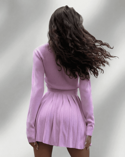 Bianca Set by RAMBLION, pink knit mini dress with pleated skirt, stylish and elegant for any occasion.