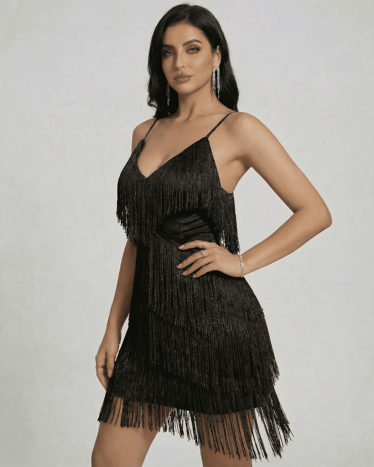 Black Lamé Mini Dress by RAMBLION with V-neck and layered fringe, perfect for evening glam.