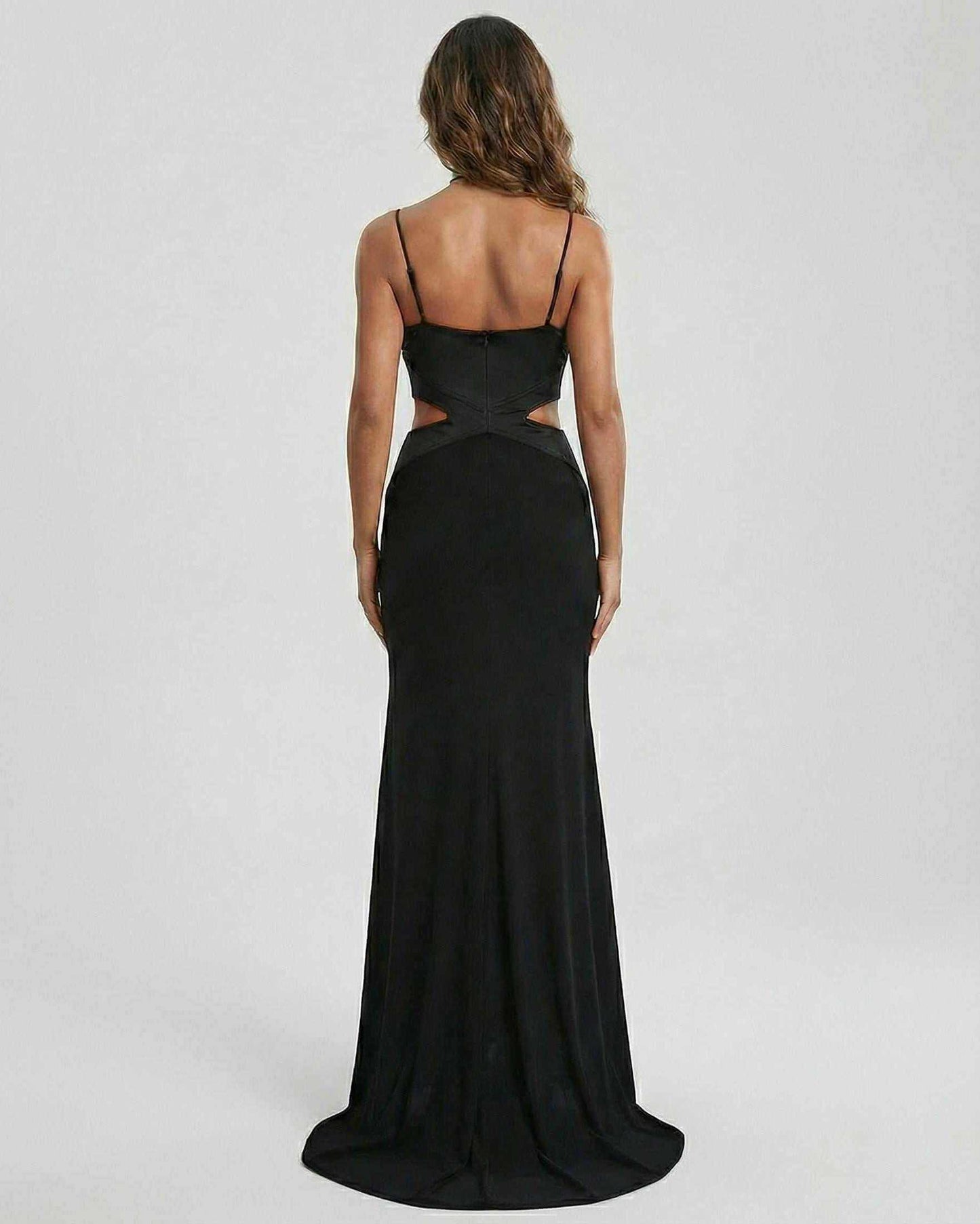 Back view of the RAMBLION Jersey Maxi Dress, a black ankle-length, strapless evening gown featuring a contemporary silhouette.