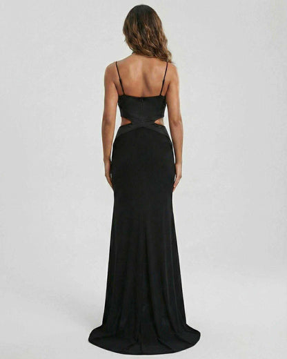 Back view of the RAMBLION Jersey Maxi Dress, a black ankle-length, strapless evening gown featuring a contemporary silhouette.