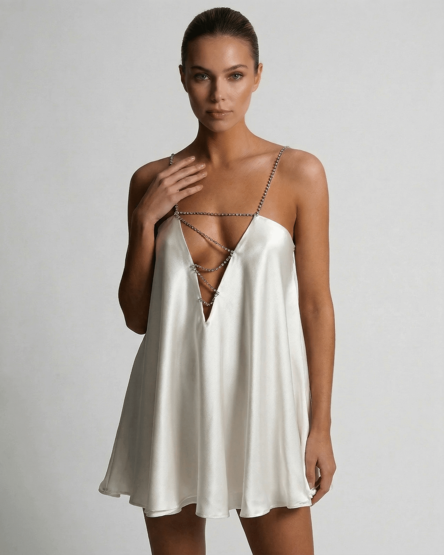 Brno Mini Dress by RAMBLION in white satin, elegant V-neck design for summer nights and cocktail parties.