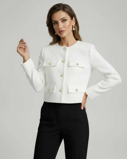 Buxy Jacket by RAMBLION: Elegant white cropped jacket with gold-tone buttons, perfect for sophisticated occasions.