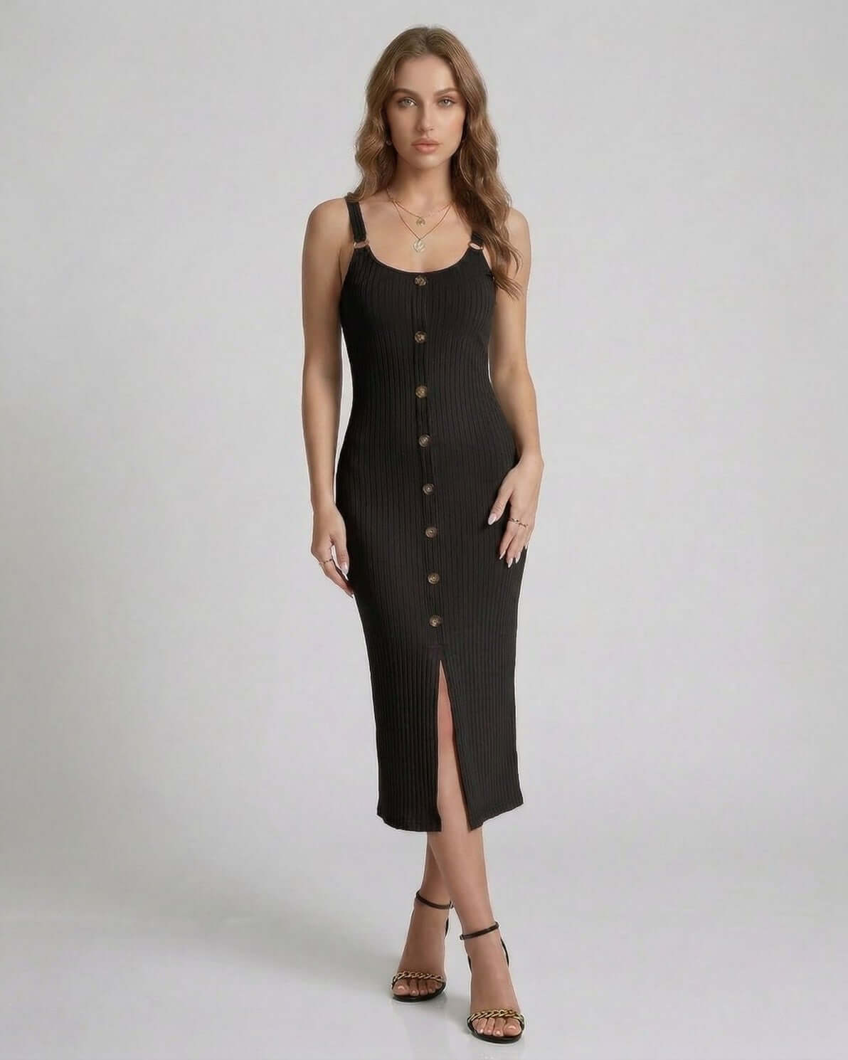 Buxy Midi Dress in black, featuring ribbed texture and a modern silhouette, perfect for versatile occasions by RAMBLION.