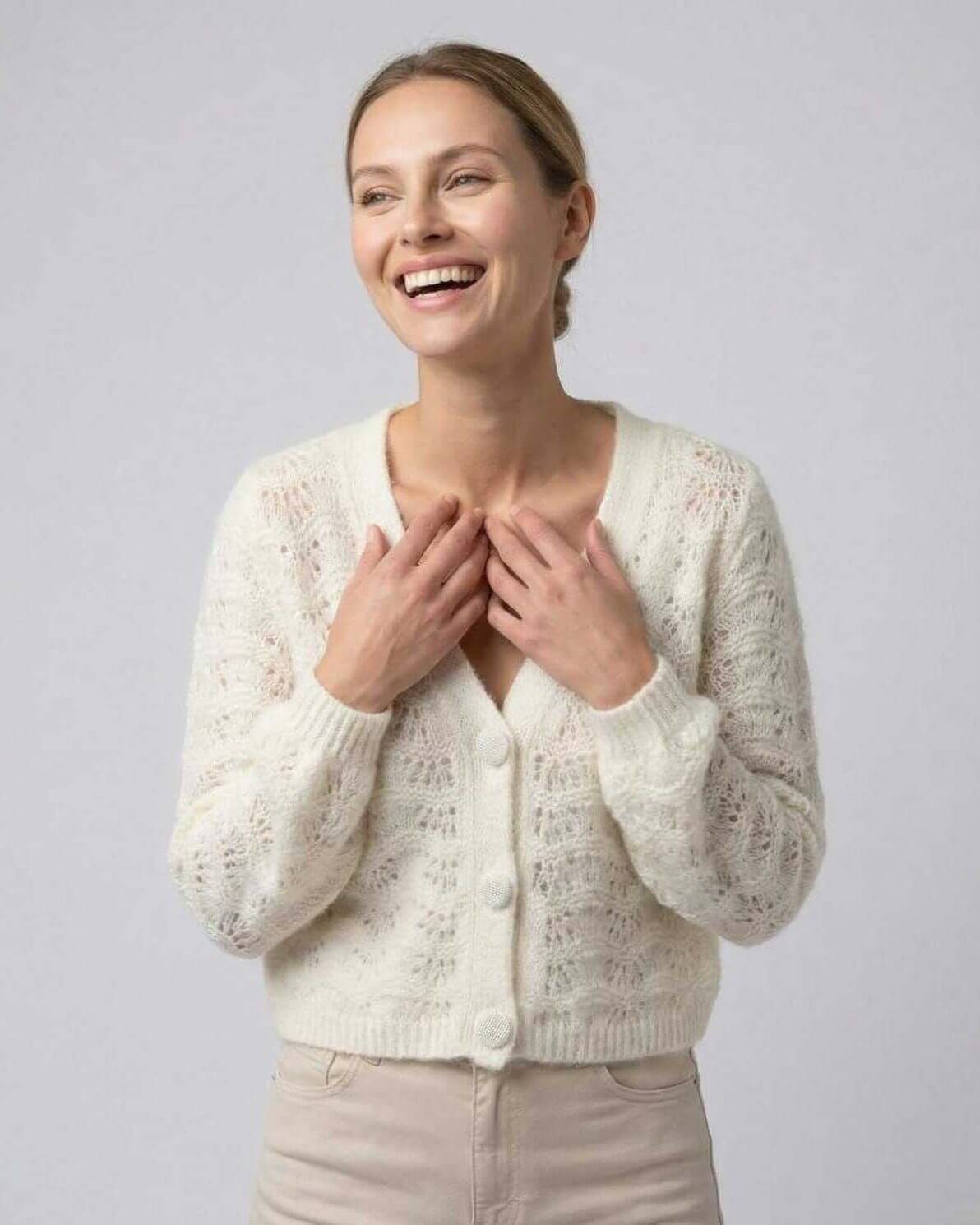 Cala Cardigan by RAMBLION, white hollow-out knit, loose fit, perfect for layering, stylish comfort for any occasion.
