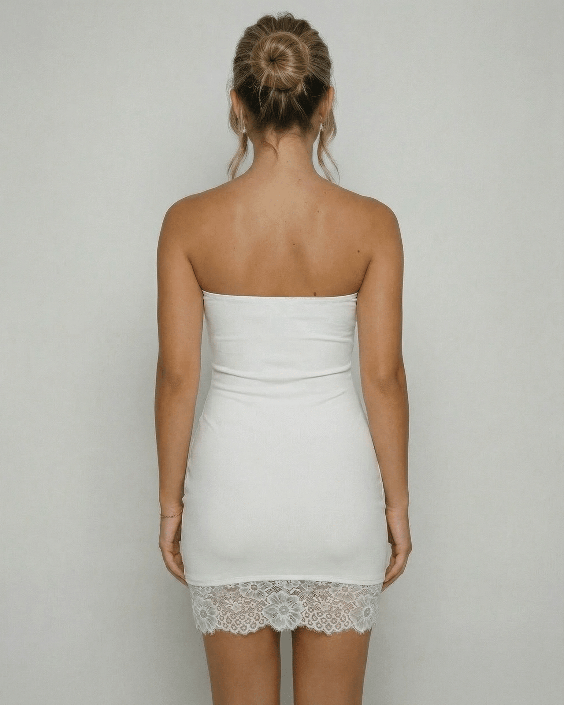 Cannes Mini Dress back view, strapless design, white mini dress with lace hem, by RAMBLION, perfect for vintage charm.