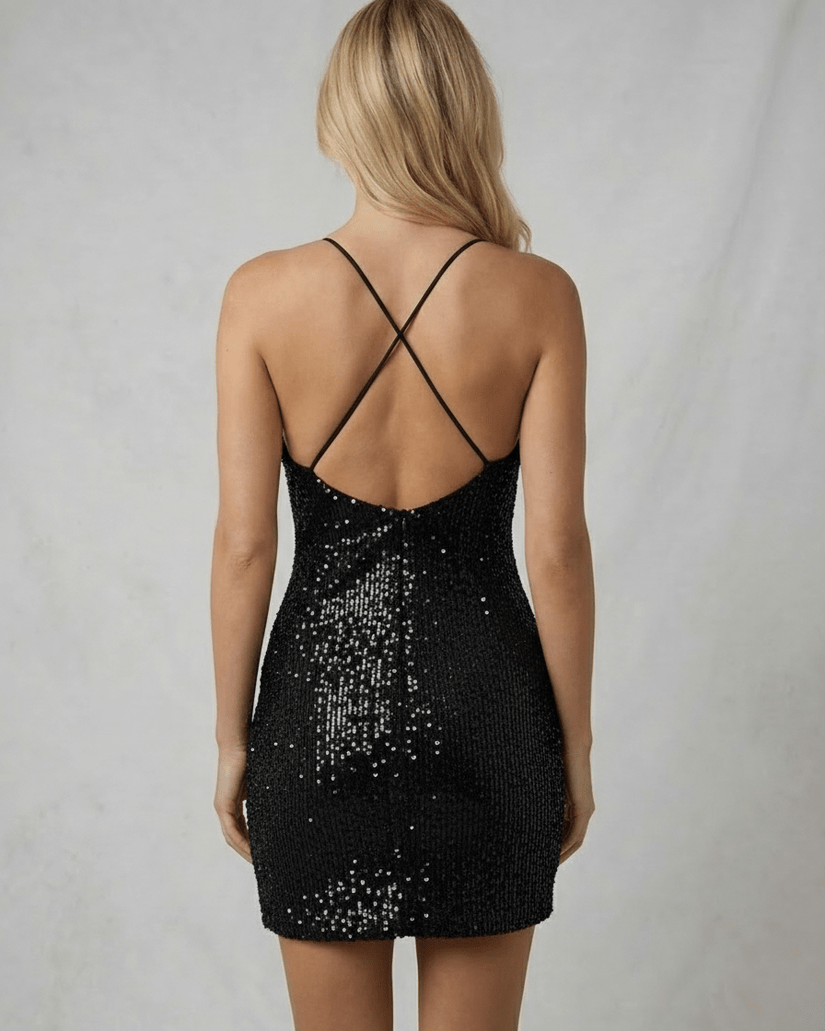 Back view of Capri Mini Dress by RAMBLION showing a sequin overlay, crisscross straps, perfect for parties.