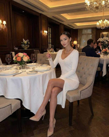 Chic Carp Midi Dress in white V-neck style, perfect for elegant dining occasions, featuring modern ribbed knit by RAMBLION.