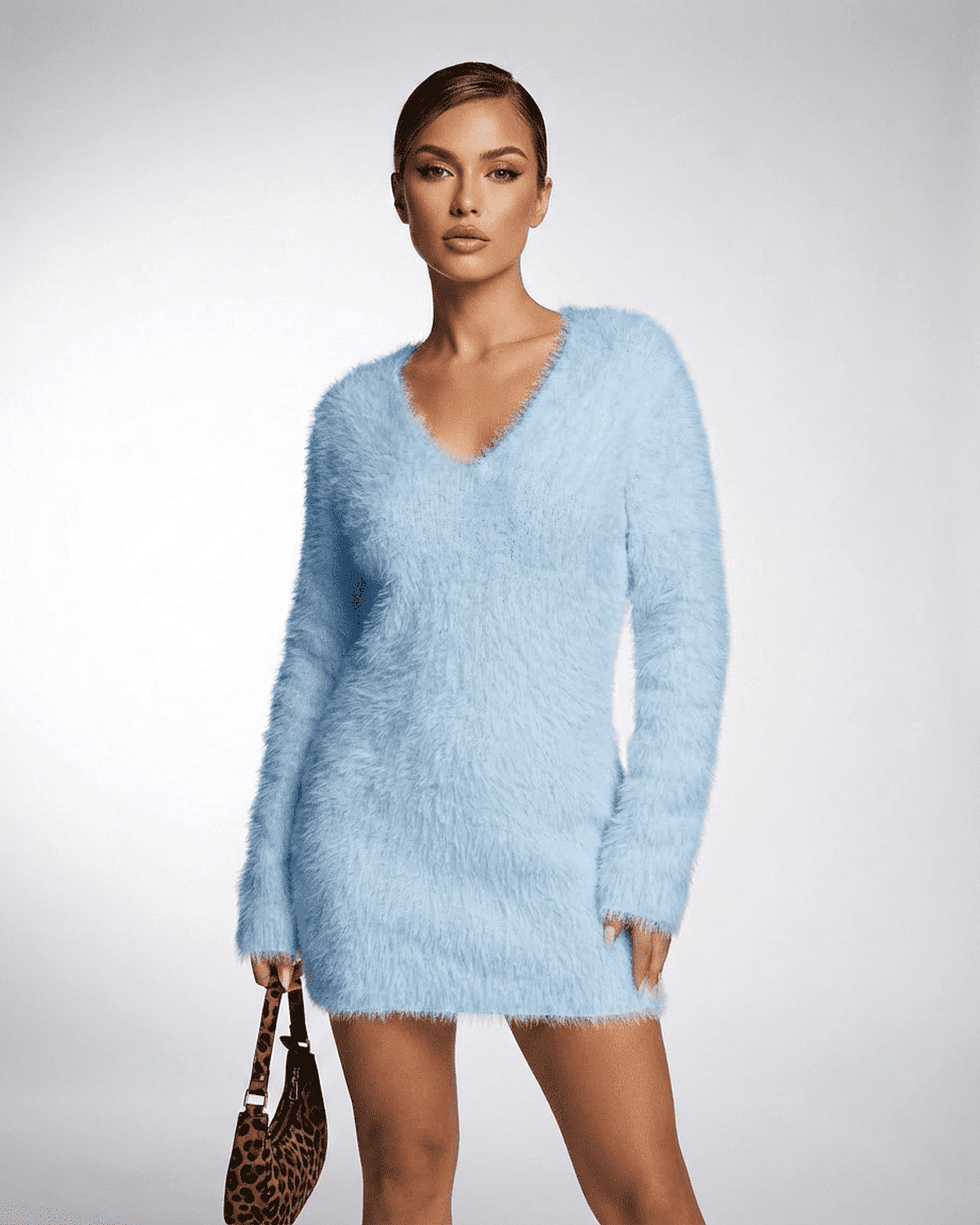Celeste Sweater by RAMBLION in soft blue, featuring a V-neck and fuzzy plush knit design, perfect for stylish comfort.