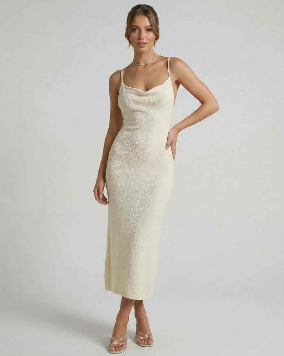 Cora Midi Dress from RAMBLION, featuring a sleek silhouette, elegant design, perfect for modern occasions.