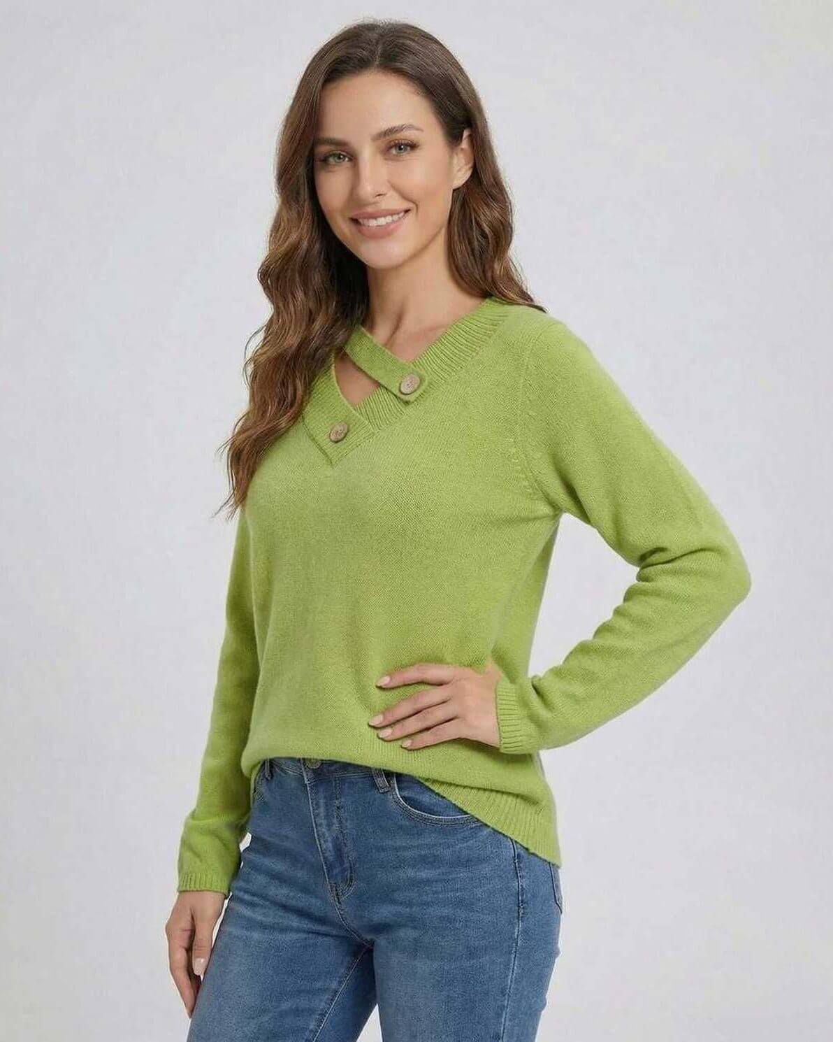 Cove Sweater in green with asymmetric strap and button detail by RAMBLION, perfect for fall and winter outfits.