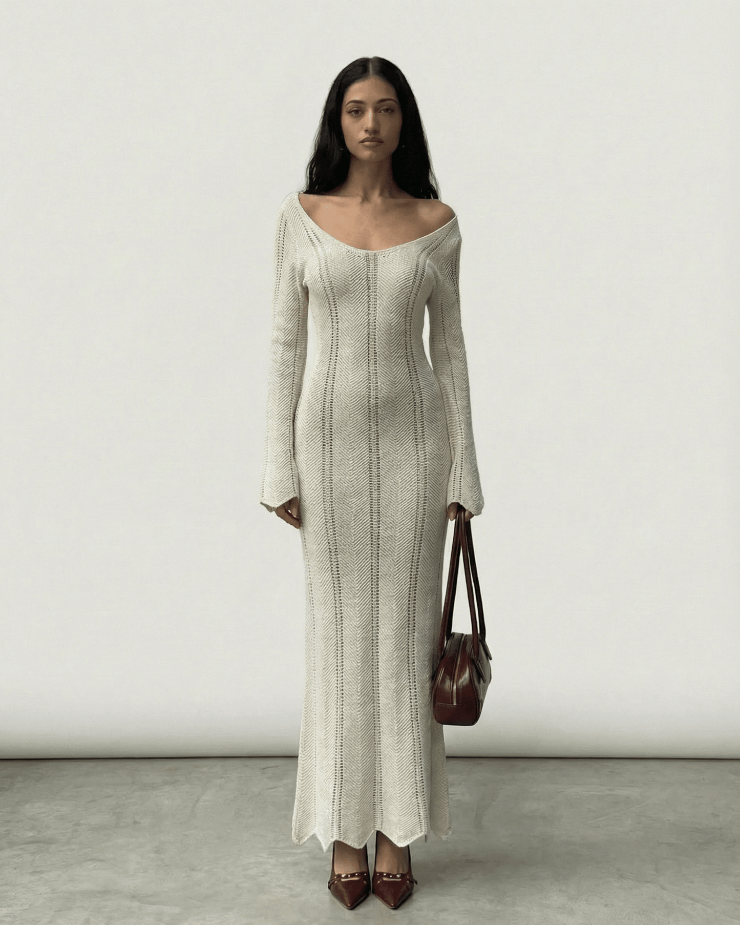 Cyra Maxi Dress in white featuring V-neck, ribbed details, feminine silhouette, perfect for elegant occasions by RAMBLION.