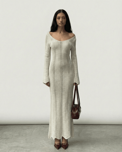 Cyra Maxi Dress in white featuring V-neck, ribbed details, feminine silhouette, perfect for elegant occasions by RAMBLION.