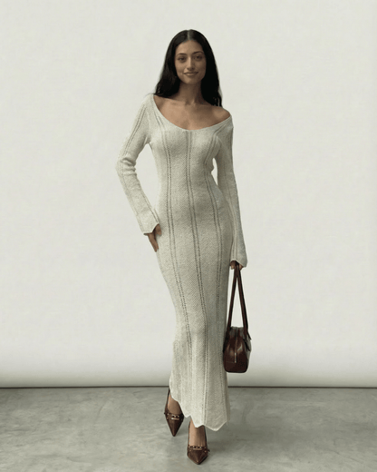 Cyra Maxi Dress in chic white, featuring ribbed details for a sleek look, perfect for any occasion by RAMBLION.