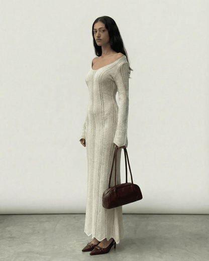 Cyra Maxi Dress in white with ribbed design, V neck, perfect for stylish occasions. By RAMBLION.