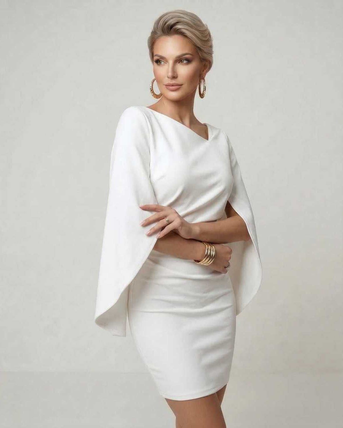 Dahl Mini Dress by RAMBLION, chic white mini dress, elegant design, round neck, perfect for special occasions.