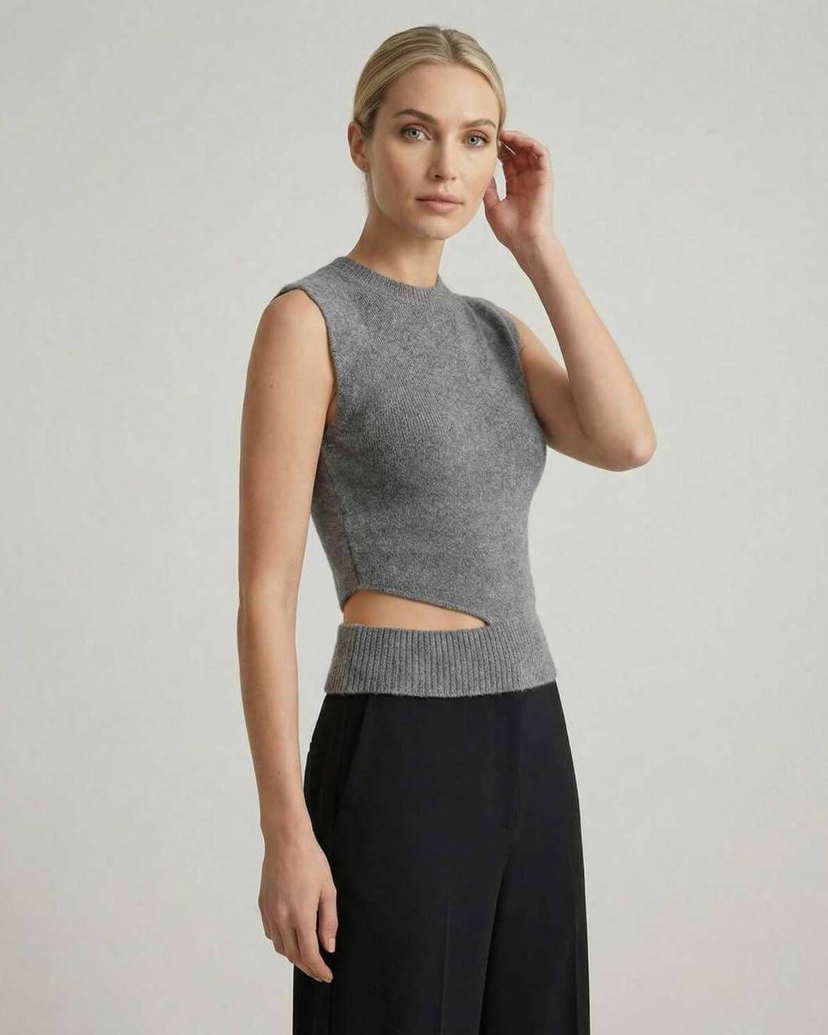 Dama Top by RAMBLION, a stylish grey knit with side cutout, perfect for casual or work occasions.