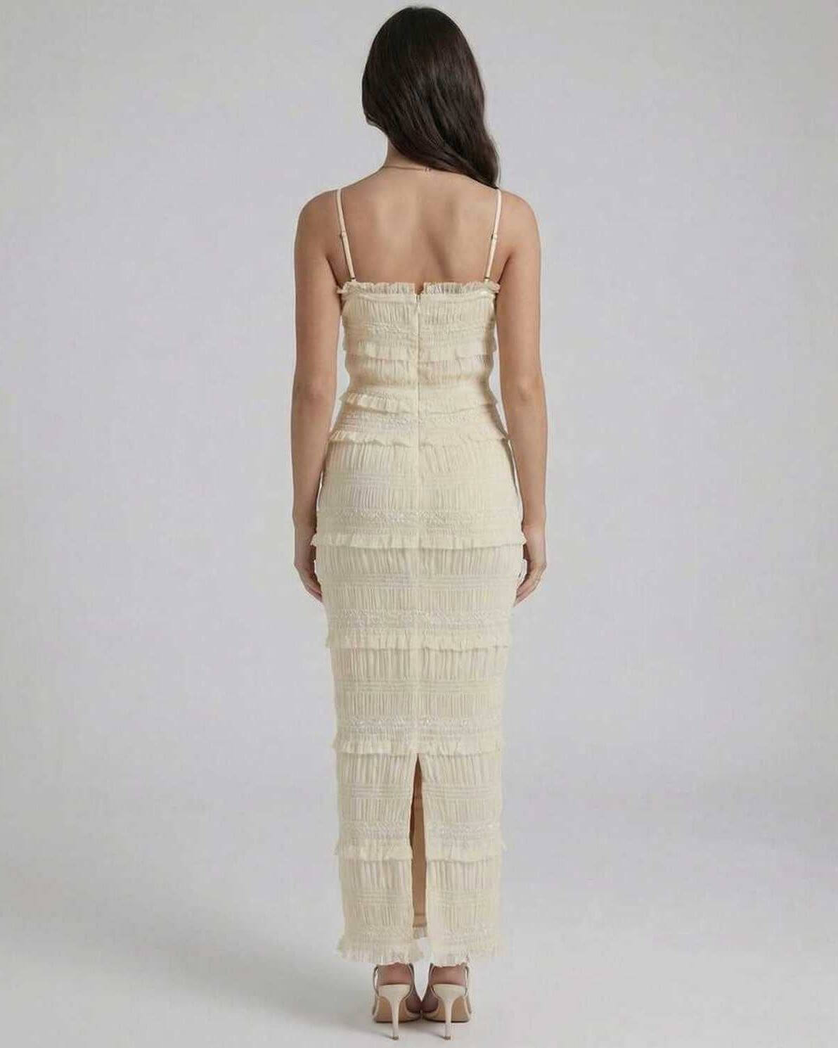Back view of Damask Maxi Dress by RAMBLION, showcasing textured design and elegant fit for special occasions.