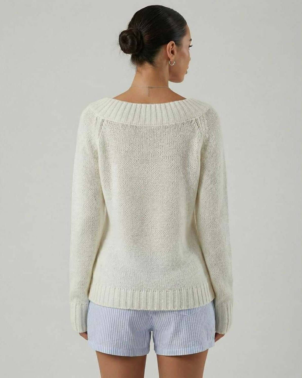 Back view of Dari Sweater in soft white, featuring a boat neck and relaxed fit, perfect for casual autumn outings - RAMBLION.