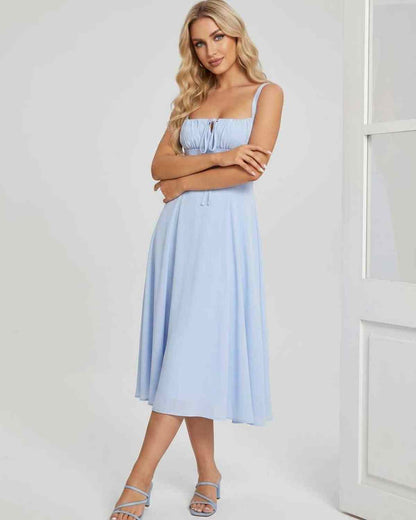 Ramblion Eda midi dress — square neck neckline · fabric close-up · styled for cocktail season