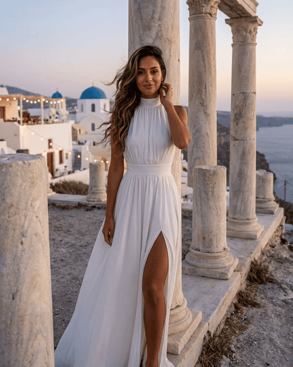 Elara Maxi Dress by RAMBLION in elegant white, featuring sleeveless turtleneck design and side slit