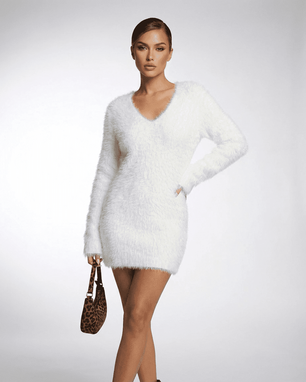 Elara Sweater in white, V-neck fuzzy plush knit by RAMBLION, perfect for fall and winter wardrobes.