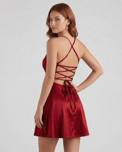 Elbe Mini Dress by RAMBLION, red satin mini dress with a square neckline and crisscross back, perfect for elegant occasions.