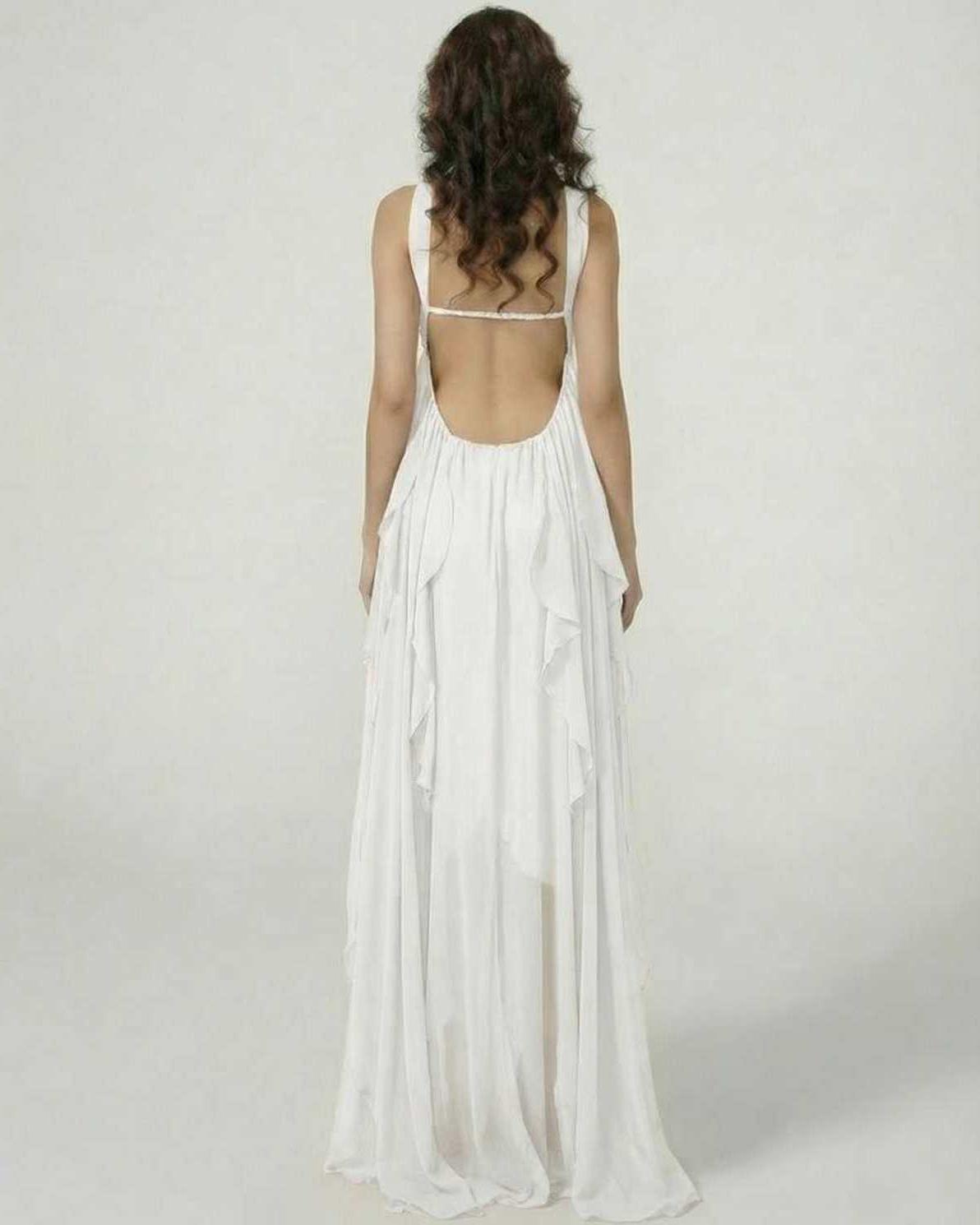 Elegant back view of the Elva Maxi Dress by RAMBLION, featuring ruffled skirt, strapless design, perfect for special occasions.