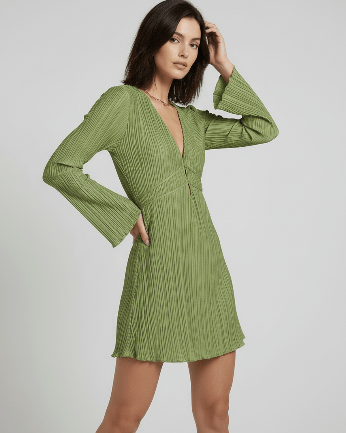 Eva Mini Dress in green, V neck, pleated design, perfect for elegant occasions by RAMBLION.