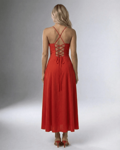 Back view of the Fern Midi Dress in vibrant red, showcasing a square neck and lace-up detailing, perfect for elegant occasions.