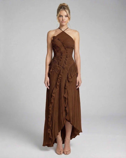 Fia Maxi Dress featuring a halter neckline, pleated design, and ruffle accents in deep brown by RAMBLION, perfect for elegant occasions.