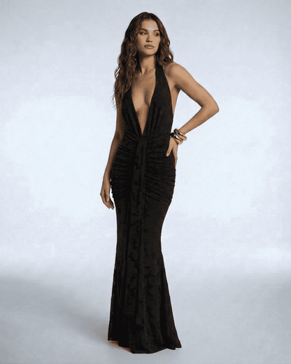 Figi Maxi Dress featuring a deep V-neck, ruched detail, and elegant silhouette. Perfect for evening events. By RAMBLION.